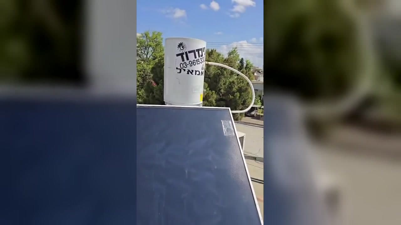 התקנת דוד שמש 120 ליטר חברת נימרוד עם קולט שמש חדש על גג בחיפה